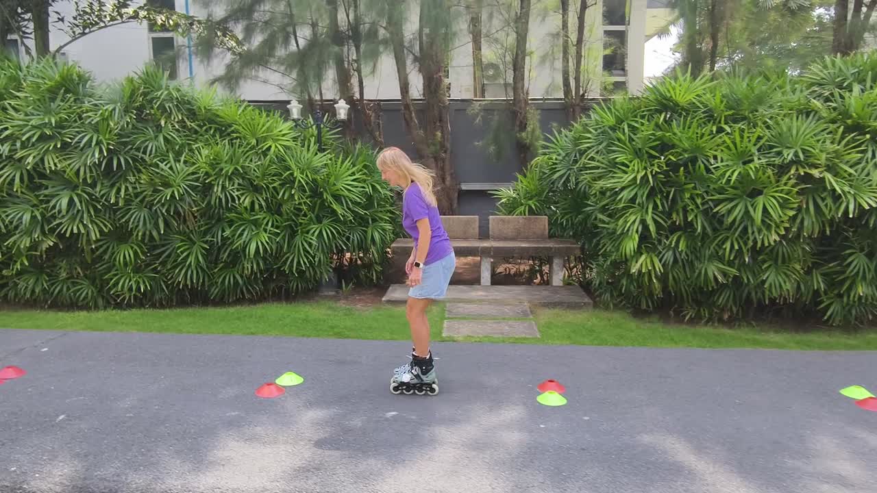 Woman rollerblading practice in a park
