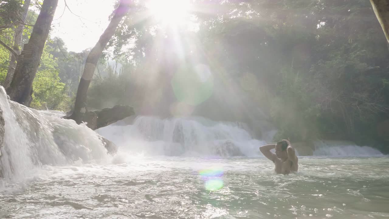 Relaxing by a Waterfall in the Jungle