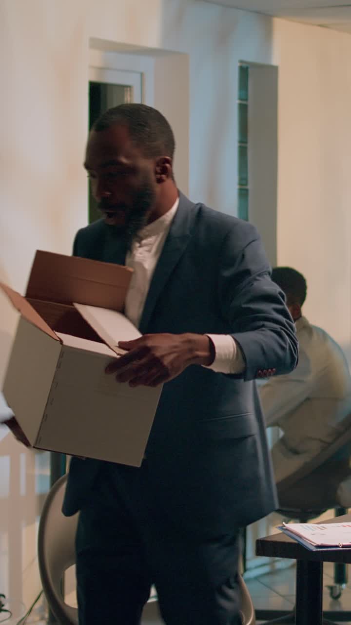 Vertical video Businessman excited to quit job
