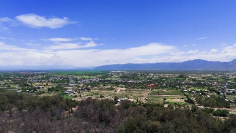aerial view of the city and the mountains in lam dong