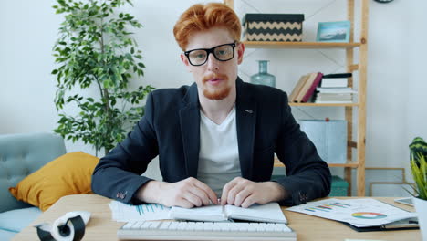 businessman working from home, reviewing data
