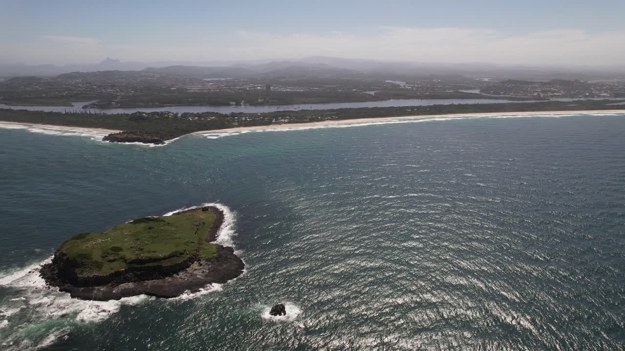 Fingal Head Coastline With Cook Island In Foreground. Northern Rivers Region of NSW, Australia. aerial sideways shot