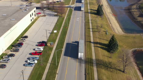 tractor-trailers-on-highway-going-through-logistics-area,-Bolingbrook,-Chicago