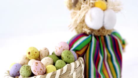 basket with easter eggs and easter bunny