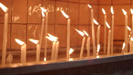 candles burning in a religious setting
