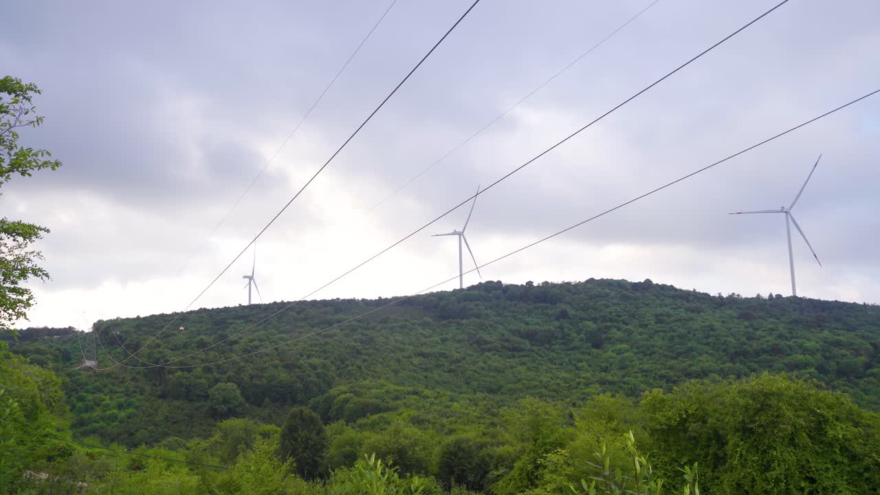 Switchyard and wind turbines.