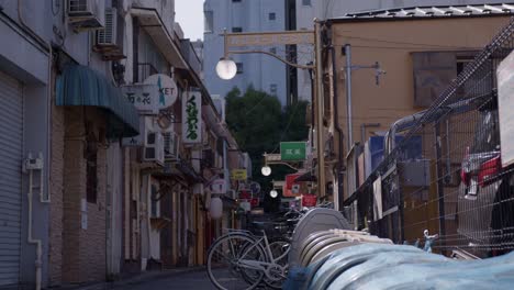 exploring a narrow japanese alleyway