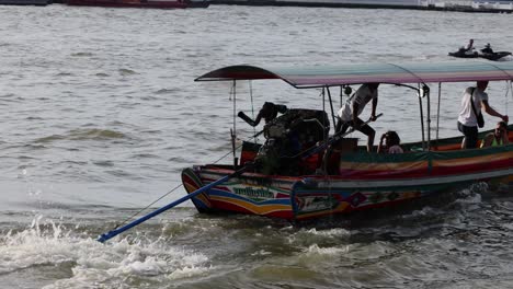 traditional boat navigating through choppy waters