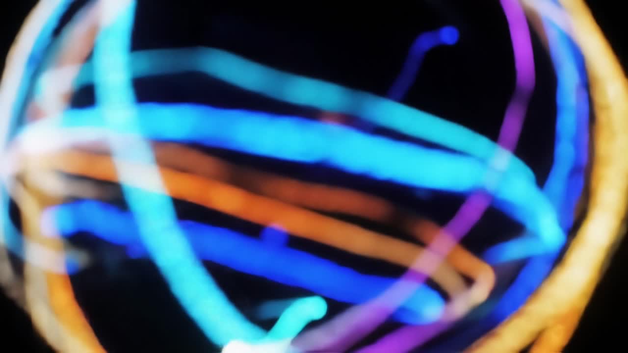 A Vibrant Display of Abstract Light Trails in Motion, Captured in Two Frames to Showcase the Colorful Energy and Artistic Expression of Light Photography