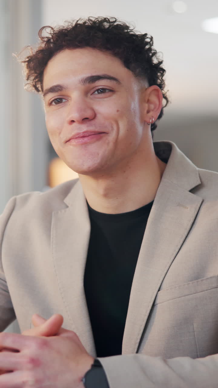 Happy Young Man Smiling and Listening Attentively