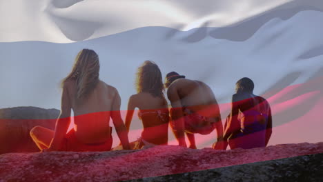 sitting on rocks, four people with russian flag animation in background