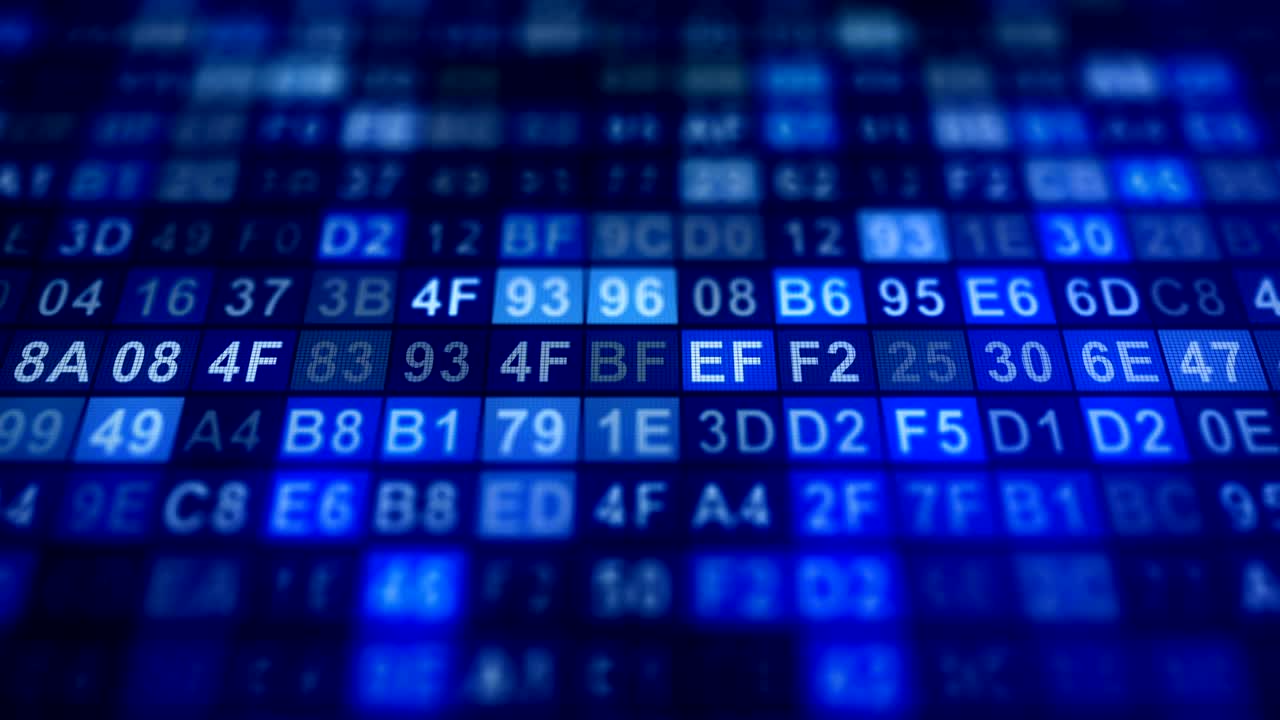 dígitos hexágramos azules que cambian al azar por computadora en una pantalla digital futurista