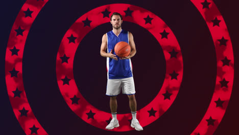 Male-basketball-player-against-stars-on-spinning-circles