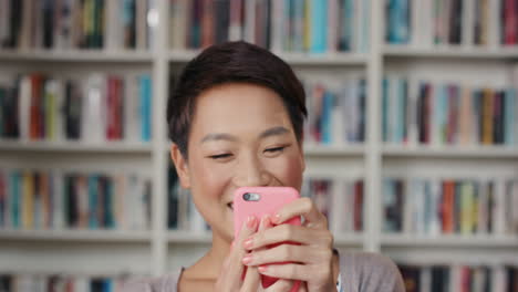 Happy-Beautiful-woman-using-smart-phone-at-home