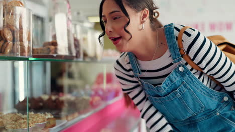 panadería, ventana y elección de las mujeres con pastel