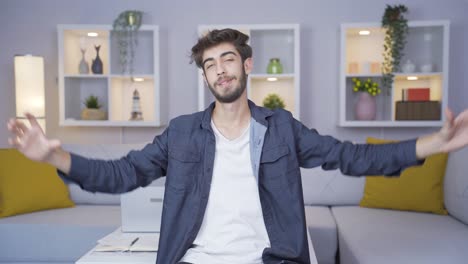 Man-making-heart-sign-at-camera.