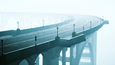 illuminated empty road bridge in a fog