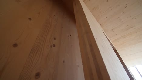 detail of wooden walls made of striped board in a construction site with camera movement