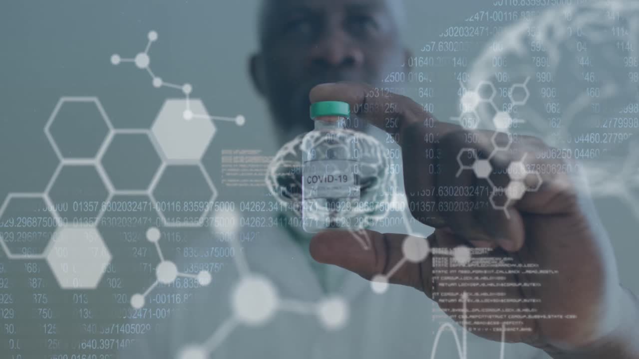 Medical data processing against male doctor wearing face mask holding covid 19 vaccine