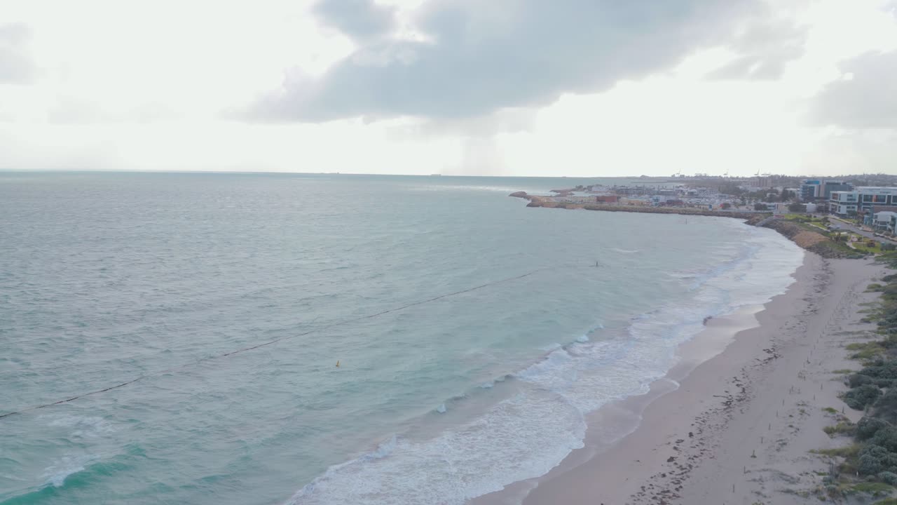 Drone footage along Coogee Beach on a winter afternoon