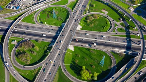 timelapse aerial view of a freeway intersection traffic trails in moscow.