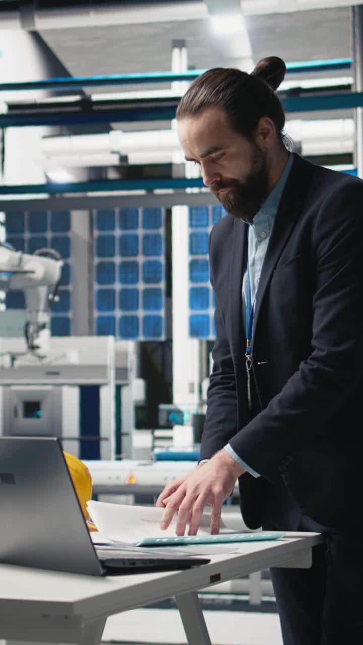 Vertical Video Professional industrial inspector reviews solar panels production