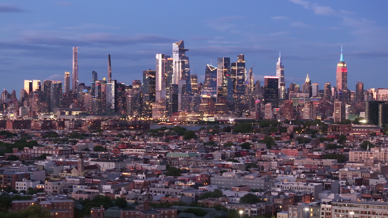Aerial view of Hoboken, New Jersey at night. Shot with Midtown Manhattan in the background.