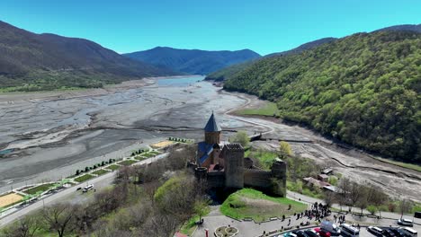 Aerial-View-Of-Ananuri-Castle-Complex-On-The-Aragvi-River-In-Georgia---drone-shot