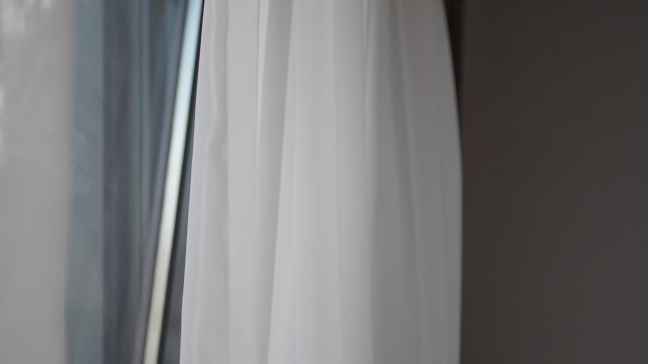 White Sheer Curtain at a Window