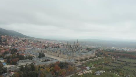 Aerial-footage-of-the-monastery-San-Lorenzo-de-El-Escorial-in-Spain-on-a-cloudy-day