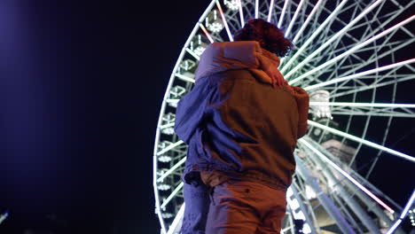 Love-couple-hugging-outdoor.-Man-circling-woman-in-hands-on-urban-street.