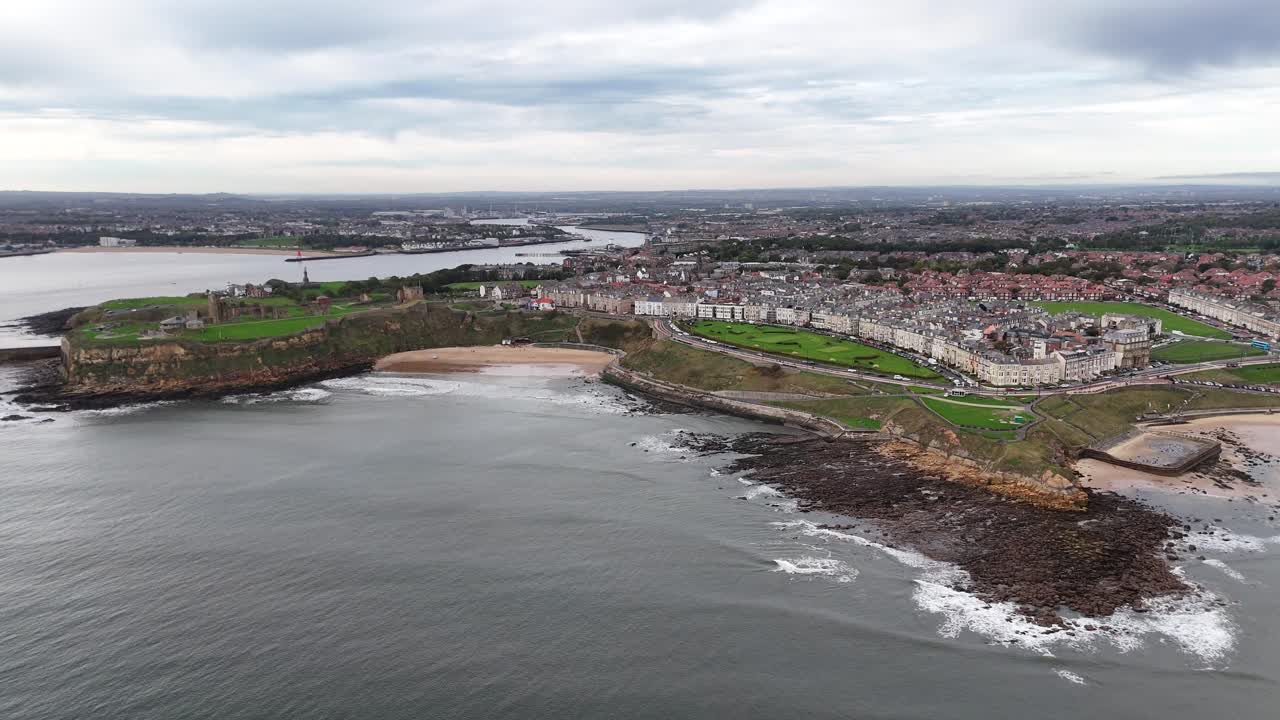Drone aerial view of tynemouth beach coastal seaside north east england british town city uk North Tyneside, in Tyne and Wear, England Priory and Castle