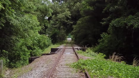 4k vertigo zolly aerial of train tracks