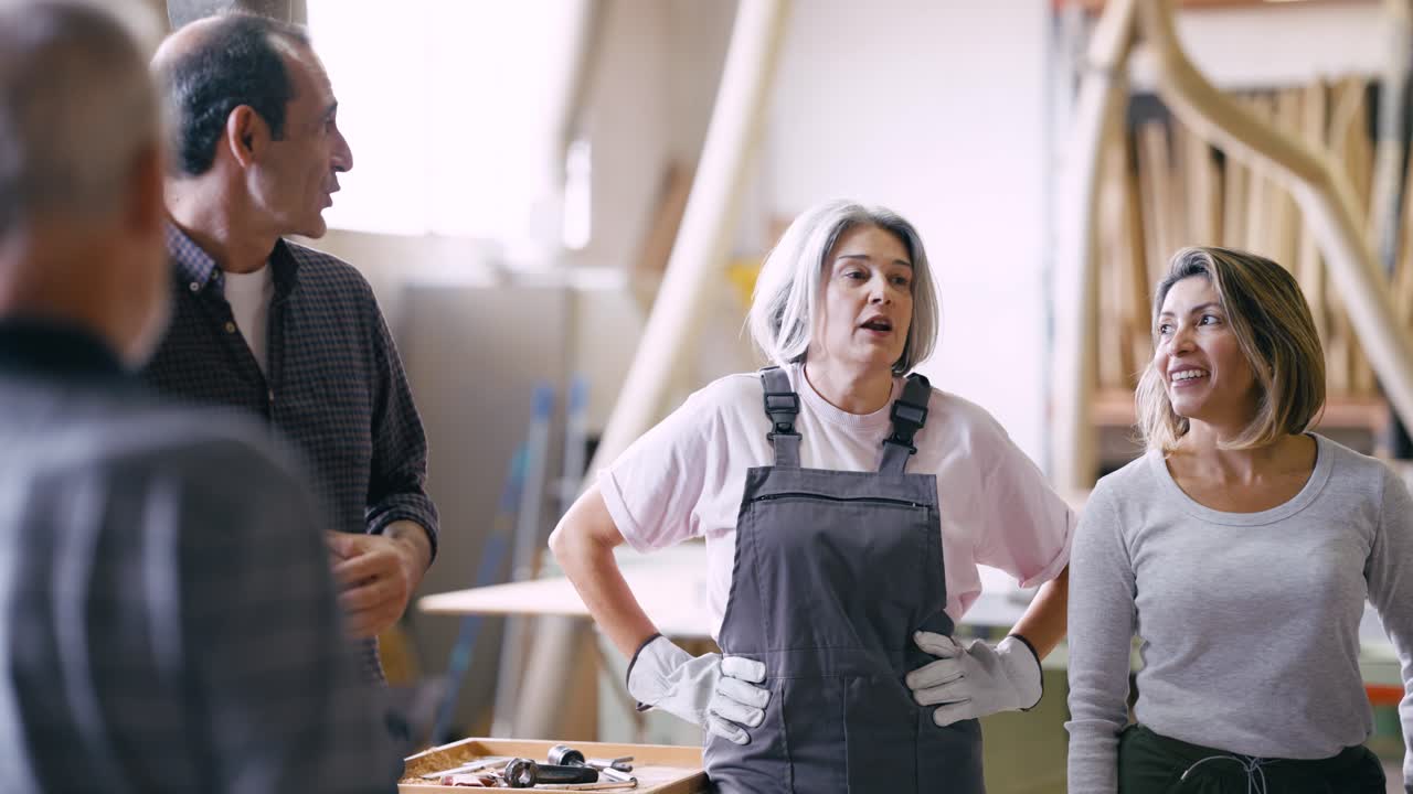Group of Diverse Workers Discussing in a Workshop