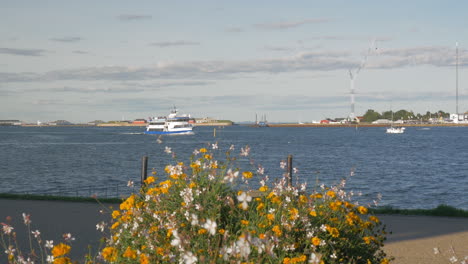 Touristic-ship-sailing-down-the-river-in-city