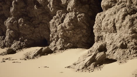 group of rocks on sandy beach