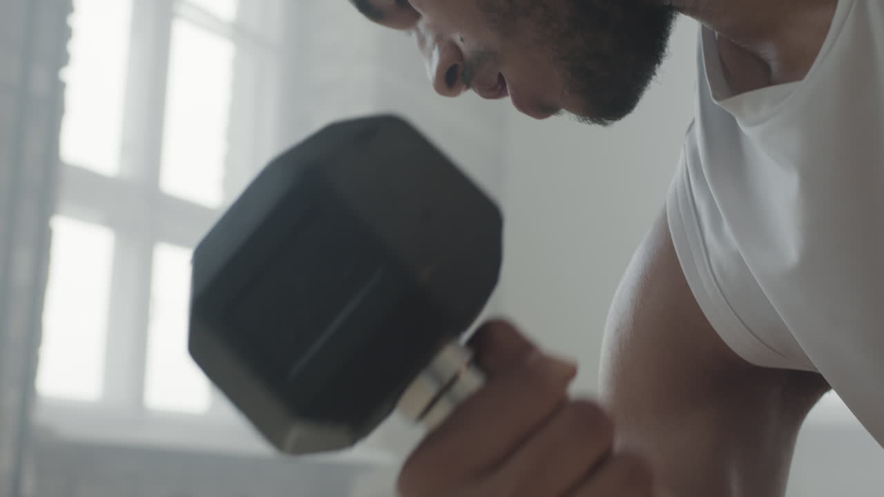 Man working out with dumbbells