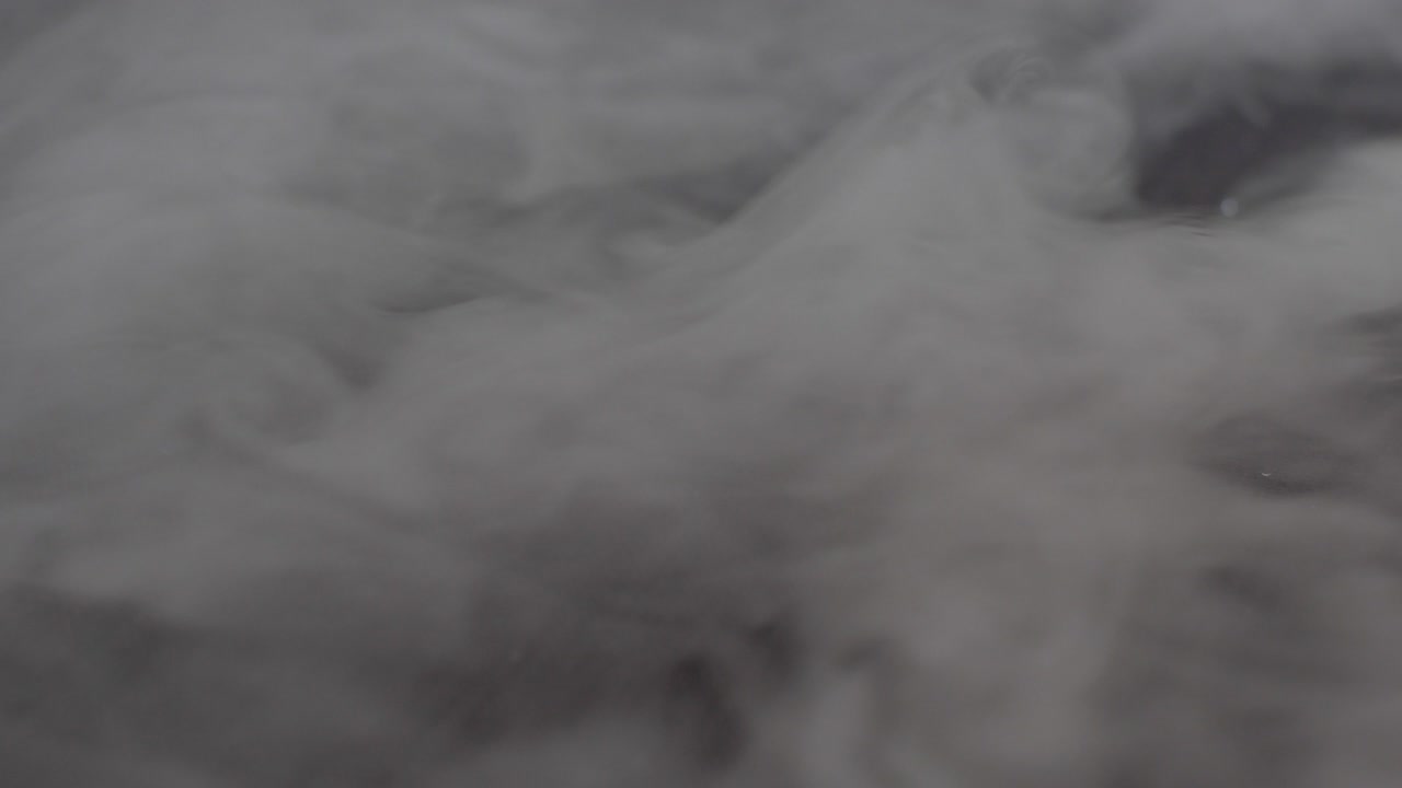 White smoke crawling from right to left