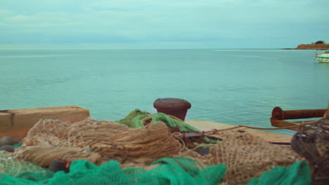 Croatian-fisher-port---view-over-the-sea---fishing-nets-in-foreground