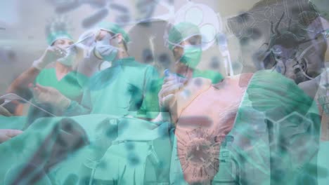 animación de células de covid-19 sobre diversos cirujanos que usan máscaras faciales en el quirófano