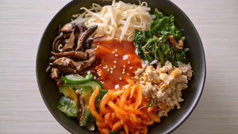 bibimbap, korean spicy salad with rice bowl - traditionally korean food style