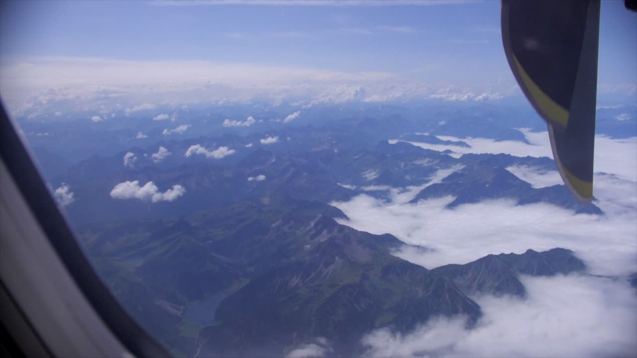 View out of a plane to the alps in Austria