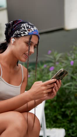 woman using phone outdoors