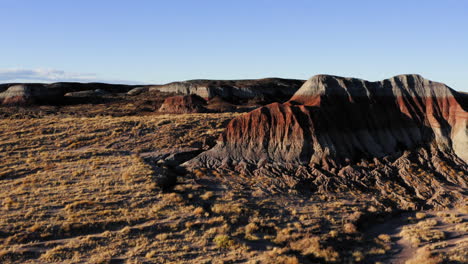 Aerial-badlands-with-teepees-at-painted-desert,-Arizona---drone-flying-shot