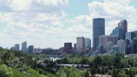 Calgary's-Bow-River-Valley-and-downtown,-a-time-lapse-with-dramatic-shadows