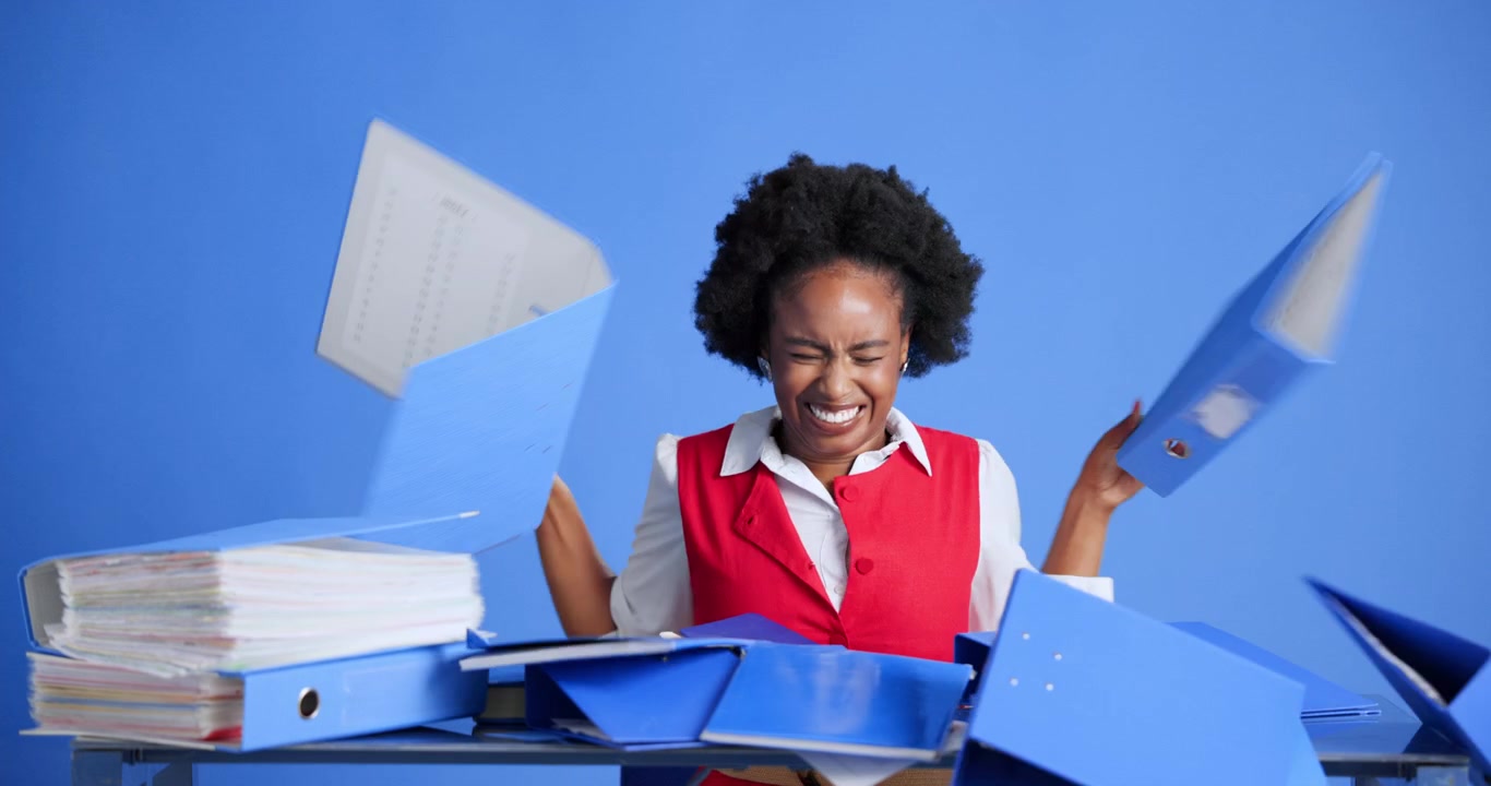 Stressed Office Worker Throwing Files and Documents in Frustration