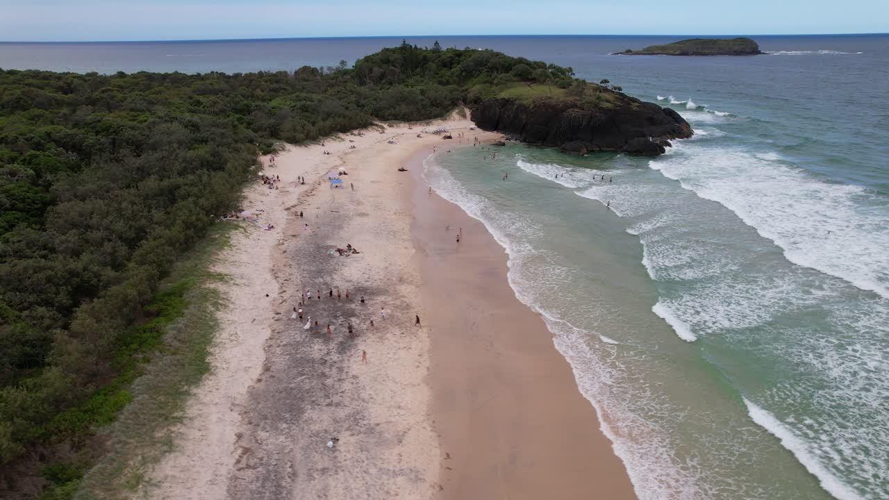 Dreamtime Beach With Tourists During Summer In Fingal Head, NSW, Australia - Drone Shot