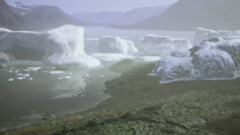 Majestic icebergs floating serenely in a tranquil icy lagoon during dawn