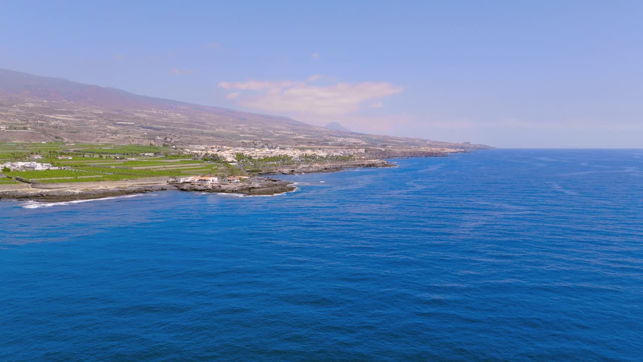 Stunning coastal view of Tenerife's natural pools in sunny Alcalá