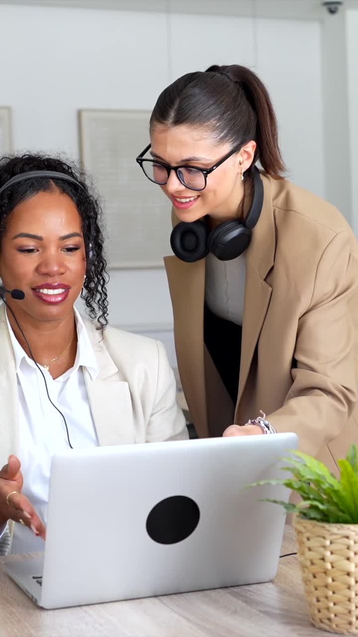 Two Businesswomen Collaborating at the Office